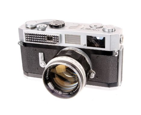 A Canon Model 7 Rangefinder Camera, chrome, serial no. 935803, with Canon f/1.4 50mm lens, chrome, serial no. 22137, body, G,