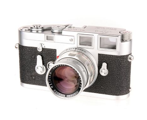 A Leica M3 Rangefinder Camera, 1959, chrome, serial no. 974228, with Leitz Summicron f/2 50mm lens, 1965, chrome, serial no. 