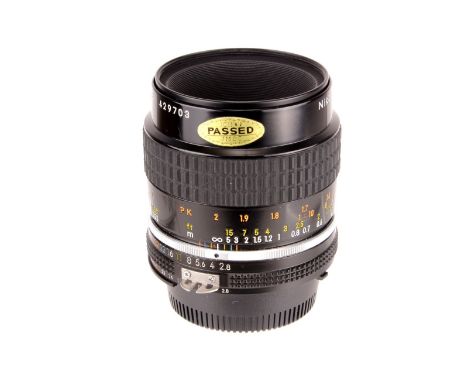 A Nikon Micro-Nikkor f/2.8 55mm AIS Lens, black, serial no. 429703, body, E, elements, VG, some light internal haze, in maker