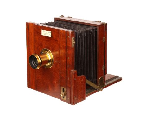 An A & G. Taylor Mahogany Tailboard Camera, serial no. 262, 4¾x6¼, with unmarked f/8 brass lens, body, G, bellows require re-