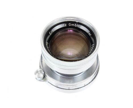 A Leitz Summicron f/2 50mm Lens, 1957, chrome, serial no. 1480652, body, VG, elements, VG, some light internal haze, with mak