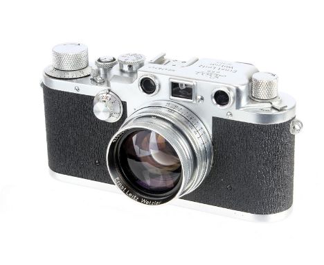 A Leica IIIc Rangefinder Camera, 1948/50, chrome, sharkskin, serial no. 478757, with Leitz Summitar f/2 50mm lens, 1948, chro