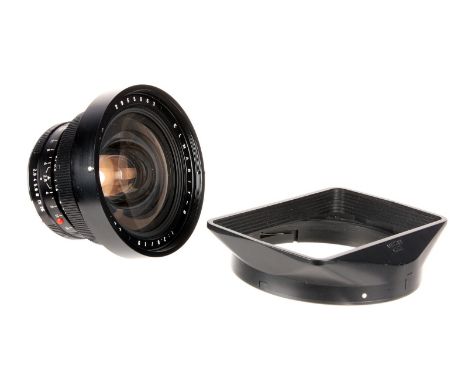 A Leitz Elmarit-R f/2.8 19mm Lens, black, serial no. 2955063, body, VG, elements, VG-E, with maker’s hood 3-Cam