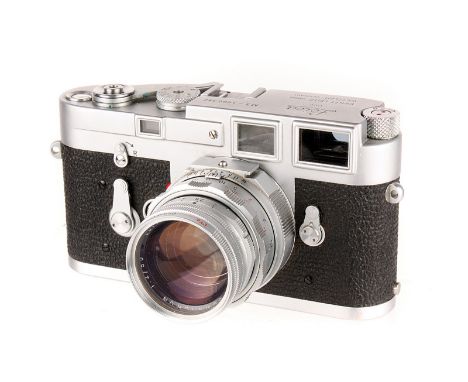 A Leica M3 Rangefinder Camera, 1960, chrome, serial no. 1000392, with Leitz Summicron f/2 50mm lens, 1960, dual range, chrome