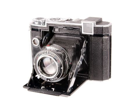 A Zeiss Ikon Super Ikonta 532/16 Camera, chrome, serial no. F2566, with Carl Zeiss Tessar f/2.8 80mm lens, serial no. 1932528