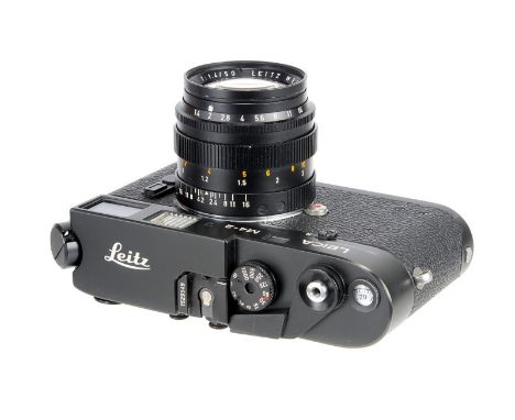 A Leica M4-2 Rangefinder Camera, 1979, black, serial no. 1529549, with Leitz Summilux f/1.4 50mm lens, 1980, black, serial no