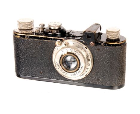 A Leica Model Ic Camera, 1930, with folding 13.5cm finder mask, black, serial no. 50206, with Leitz Elmar f/3.5 50mm lens, ni