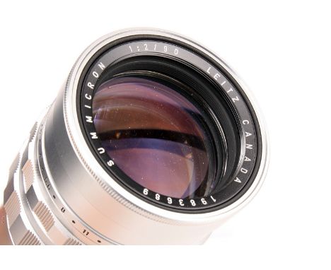 A Leitz Summicron f/2 90mm Lens, 1963, chrome, serial no. 1983689, body, G-VG, elements, G-VG, small blooming patch to middle