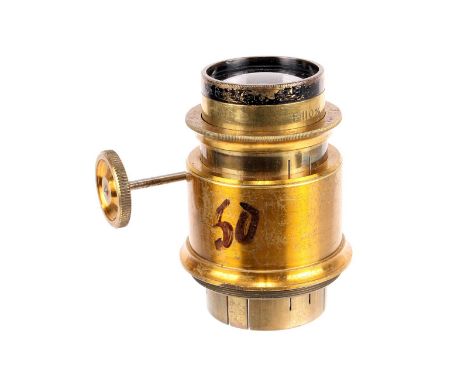 A Hermagis Objectif Cinema 110mm Cine Lens, brass bound, in rack and pinion mount, serial no. 133297, body, G, elements, VG, 