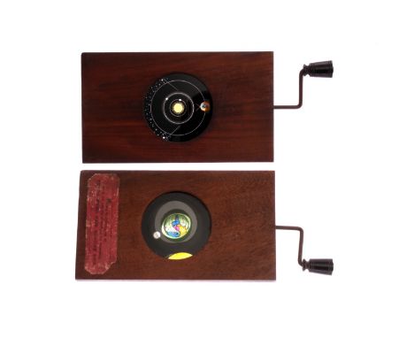 Mahogany-mounted Magic Lantern Slides: hand crank rotatary astronomical slides, hand coloured, 176 x 101mm, three with origin