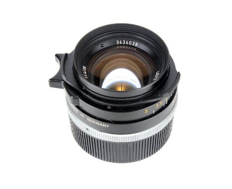 A Leitz Summilux -M f/1.4 35mm Lens, 1987, black, serial no. 3434039, body, VG, elements, VG-E, some very light internal haze