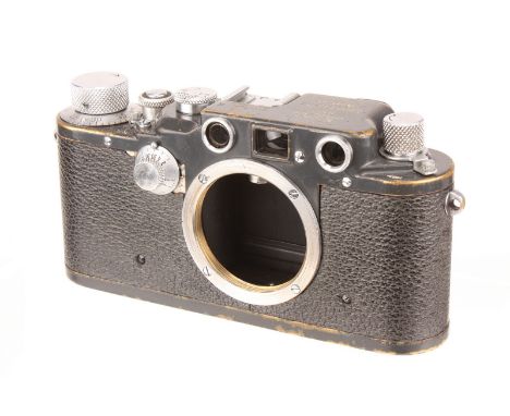 A Leica IIIc K Luftwaffen-Eigentum Rangefinder Body, 1943, grey, serial no. 390353K, FI. No.38079, body, F-G, shutter working