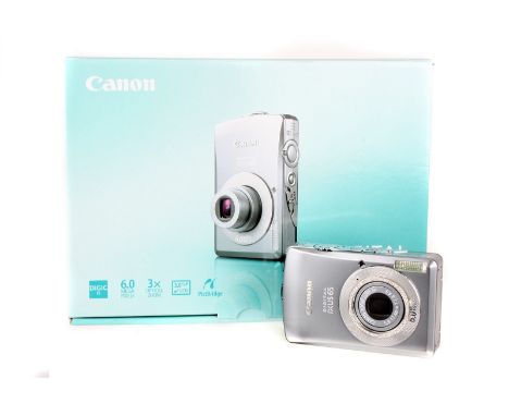 A Canon Ixus 65 Diamond Edition Digital Camera, with approx. 70 diamonds totalling 1 carat, serial no. 2538014536, body, E, l