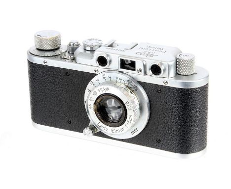 A Leica II Rangefinder Camera, 1937, chrome, serial no. 266684, with Leitz Elmar f/3.5 50mm lens, 1937, chrome, serial no. 39