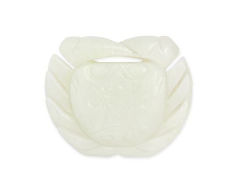 A WHITE JADEITE JADE CRAB PENDANT the white jadeite jade carved to depict a crab, 5.3cm, 42.9g. 