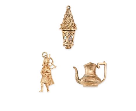 THREE VINTAGE GOLD CHARMS / PENDANTS one designed as an ornate vase, no assay marks, 3.1cm, 5.9g, one in 9ct yellow gold, des