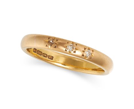 A VINTAGE DIAMOND BAND RING in 22ct yellow gold, the gold band with three star motifs set with rose cut diamonds, full Britis