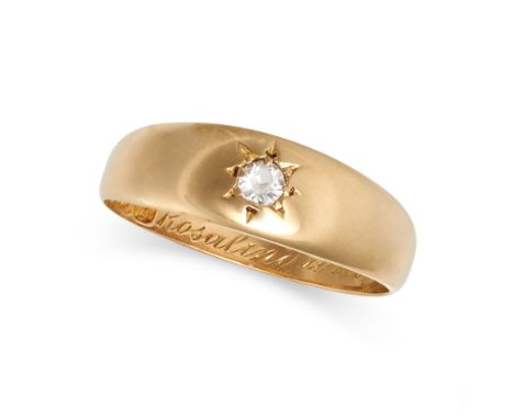 AN ANTIQUE PASTE GYPSY RING in 18ct yellow gold, set with a colourless paste stone, engraved to the shank with 'Rosalind with