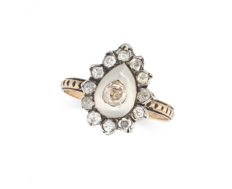 AN ANTIQUE DIAMOND CLUSTER RING in silver and yellow gold, set with an old cut diamond in a cluster of rose cut diamonds, no 