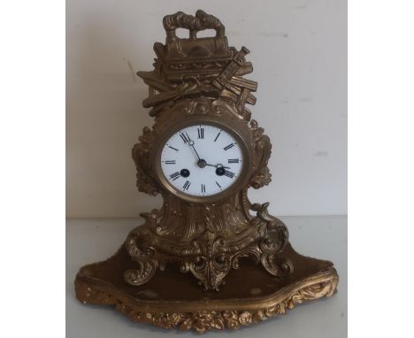 19th C French gilt metal mantel clock with white enamel dial and striking movement, on raised gilt wood base 