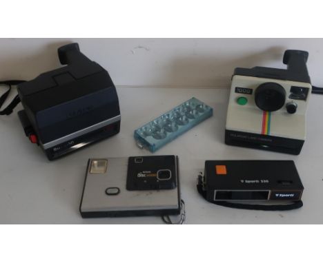 Polaroid Sun 600 LMS Land Camera, Polaroid 1000 Land Camera, Agfa ISO Rapid IF Camera, Colt 45 Camera, Kodak disc 4000 Camera
