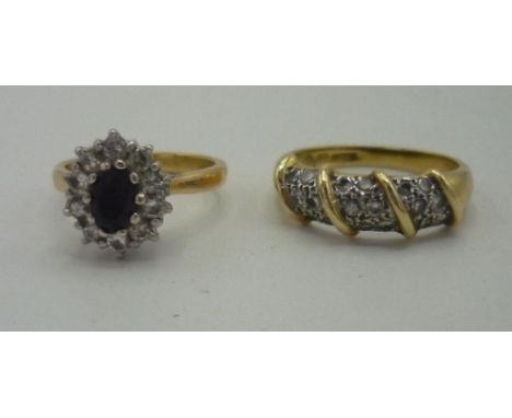 18ct gold ring pave set with diamonds stamped .750 and an ruby and diamond cluster ring stamped 18k (2)