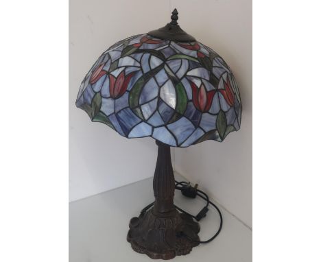 Tiffany style table lamp with cast metal bronzed base in the form of lilies and lead glazed shade (60cm) 