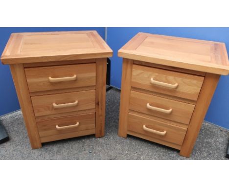 Pair of light wood three drawer bedside chests of three drawers (52cm x 62cm x 40cm) 