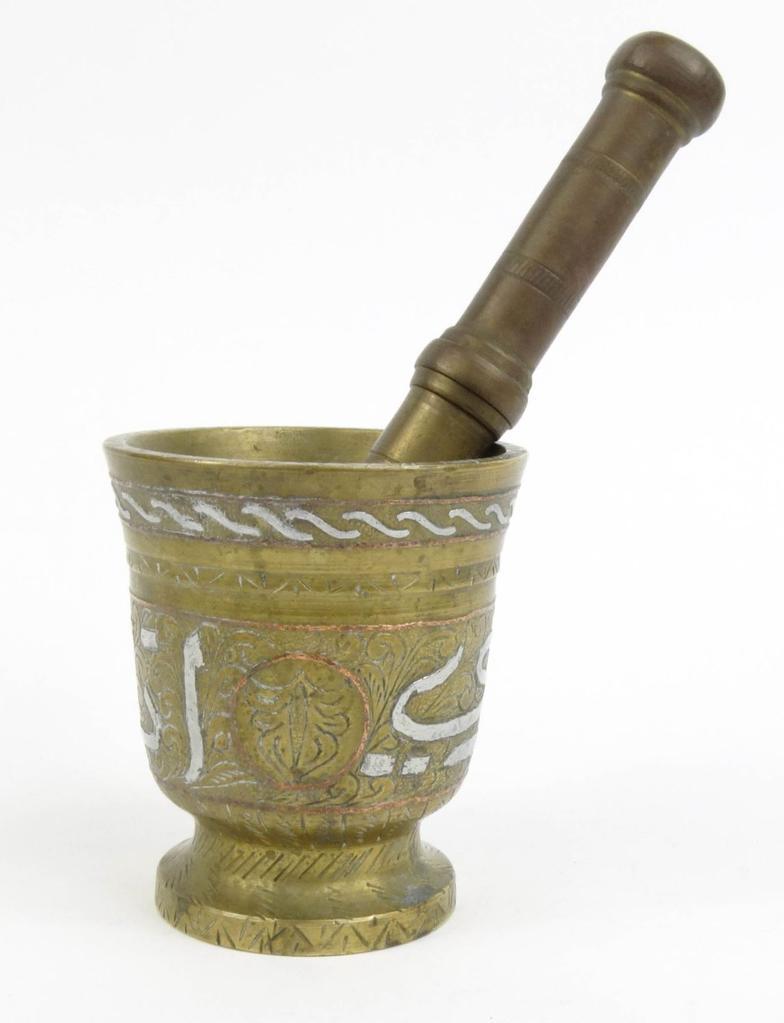 Heavy Middle Eastern Islamic design brass pestle and mortar with silver metal inlay, stamped mark