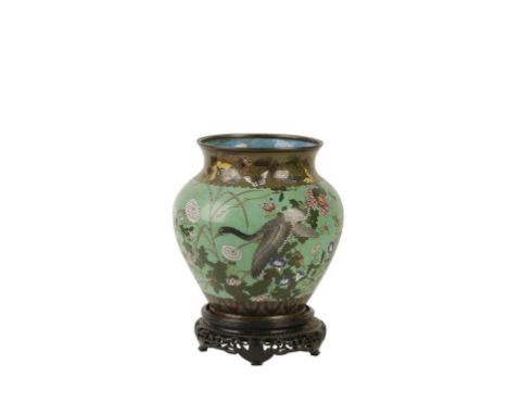 JAPANESE CLOISONNE ENAMEL VASE of baluster shape, the green ground decorated with flighting cranes within a butterfly border,