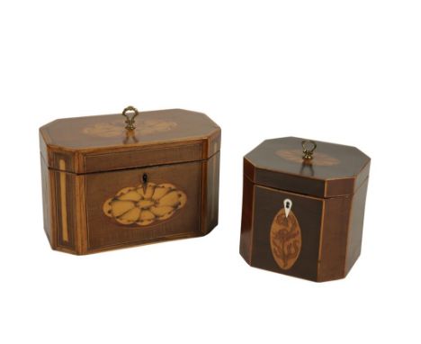 GEORGE III SATINWOOD TEA CADDY of rectangular form with canted corners, inlaid with shell paterae and crossbanded, opening to