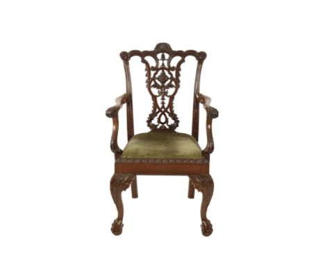 GEORGE III STYLE CARVED MAHOGANY OPEN ARMCHAIR, CIRCA 1900, IN THE MANNER OF THOMAS CHIPPENDALE, the ornate pierced vase shap