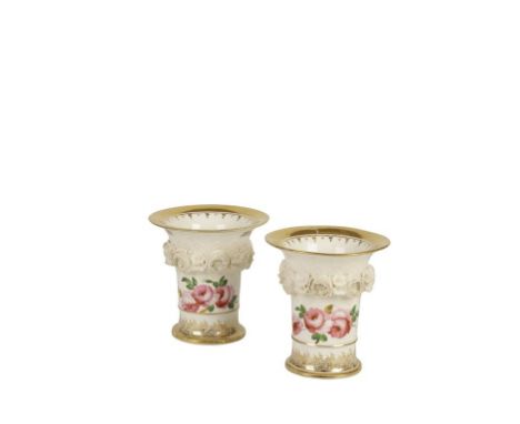 PAIR OF PORCELAIN SPODE STYLE VASES 19TH CENTURY of flared form, the cream ground modelled with floral bocage painted with ro