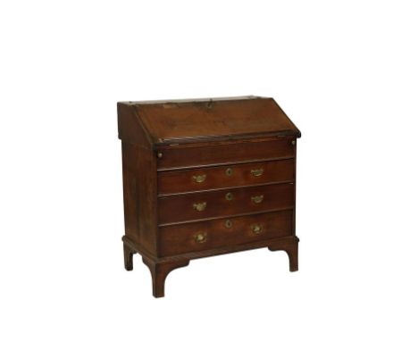 GEORGE II OAK BUREAU with a parquetry veneered fall flap with crossbanded borders, the fitted interior with a well and the ex