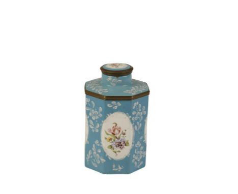 ENGLISH HEXAGONAL ENAMELLED TEA CADDY the circular lid with floral motif, the blue ground decorated with white enamel sprigs 