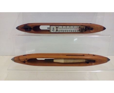 Two Shuttles one made into a Thermometer 