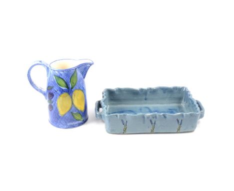 A hand-made French pottery fruit bowl and rectangular twin-handled dish, both decorated with lavender sprigs; another French 