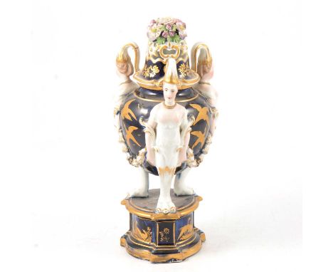 French ceramic pot pourri vase and cover, 19th century, the urn-shaped body supported by three figural forms joined by swags,