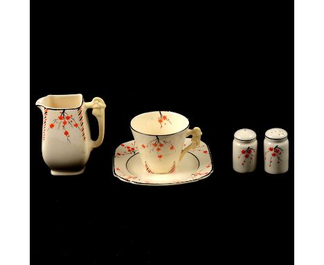 A Burleigh Ware Art Deco part dinner and tea service, black and orange branch and flower design, approximately six-place sett