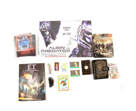 One box of mixed film memorabilia, including ET scrapbook, holographic magnets, Harry Potter coins, signed Alien v Preditor s