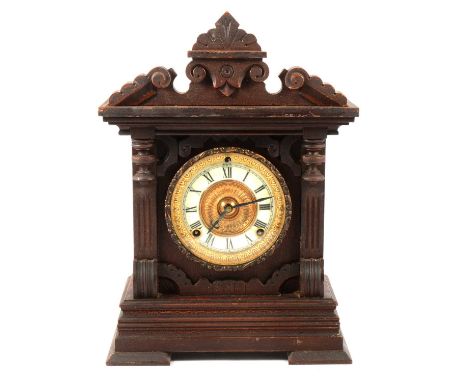 An American stained wood automatic alarm shelf clock by Ansonia Clock Co, New York, 8-day 'Summit Strike', 38cm.