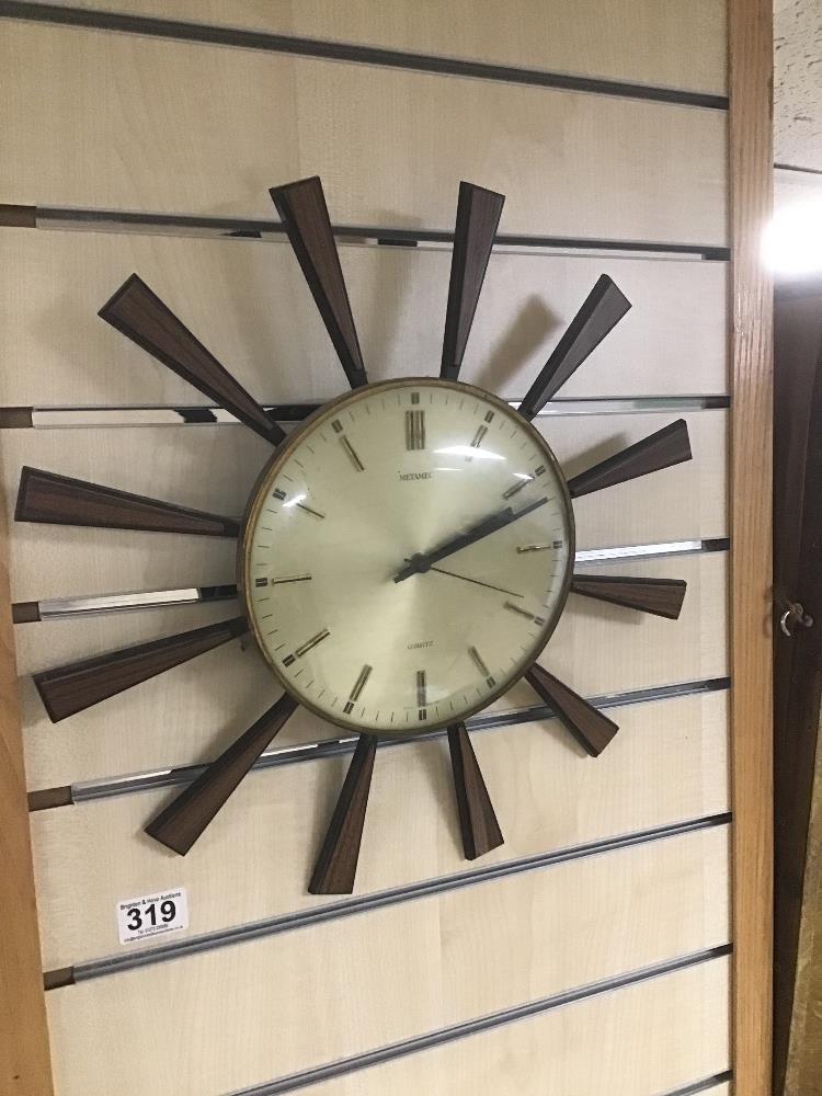 A LARGE METAMEC SUNBURST WALL CLOCK, QUARTZ MOVEMENT, 42CM DIAMETER