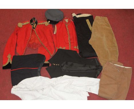 A collection of assorted military uniforms, to include Royal Artillery mess jacket with suede collar and bullion epaulettes, 