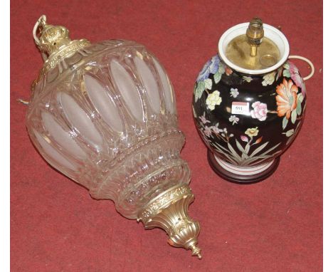 A cut and frosted glass wall light pendant with gilt metal fittings; together with a Chinese style famille noir table lamp wi