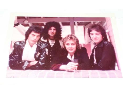 Queen, a colour image of all four band members taken by photographer Christoper Hopper for the promotion of the 1977 album Ne
