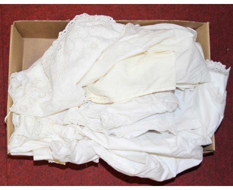 A collection of vintage linen, to include a christening gown 