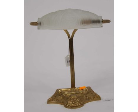 An Art Nouveau style brass desk lamp, having a frosted glass shade, h.34cm 