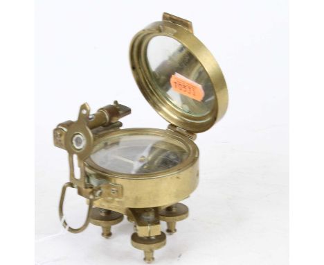 A reproduction brass desk compass after the original by Stanley