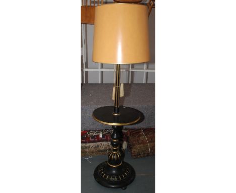 An ebonised and gilt decorated standard lamp, 20th century, height 178cm.