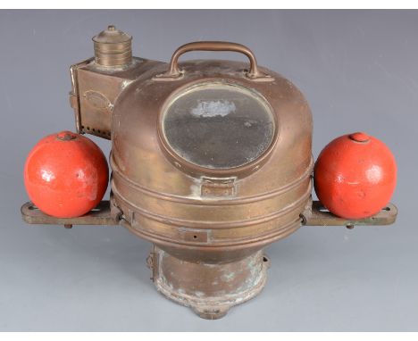 A brass ship's binnacle compass, early 20th century, with correcting spheres, the plaque inscribed 'B. Cooke & Son Ltd, Est 1